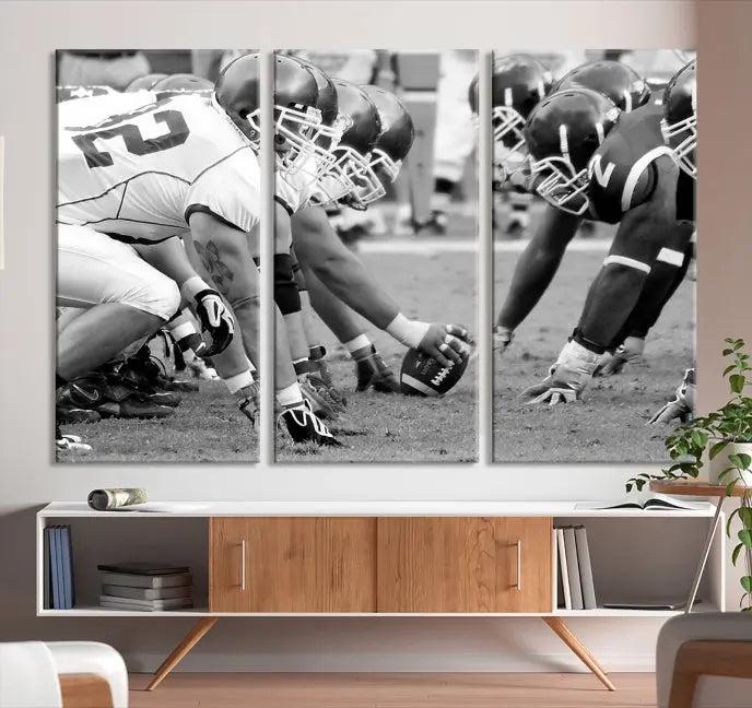 The "American Football Player Wall Art Canvas Print," beautifully rendered in black and white, captures a football scrimmage line and is printed on museum-quality canvas. This artwork is divided into three stunning panels and comes ready to hang for easy integration into your space.