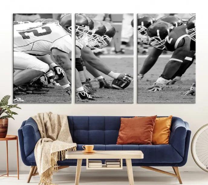 The "American Football Player Wall Art Canvas Print," beautifully rendered in black and white, captures a football scrimmage line and is printed on museum-quality canvas. This artwork is divided into three stunning panels and comes ready to hang for easy integration into your space.