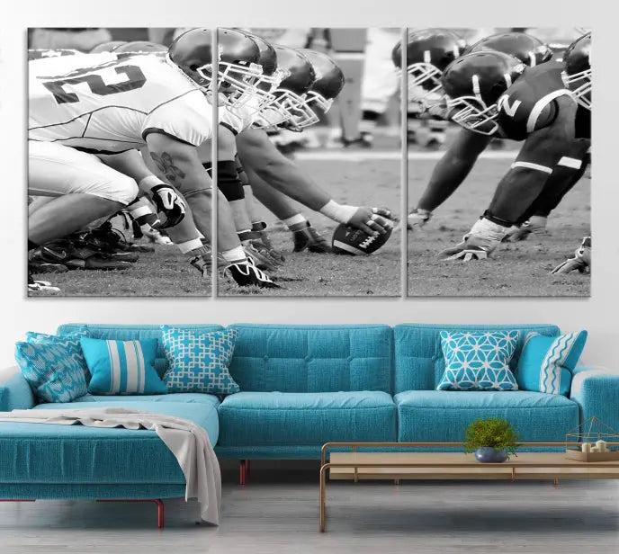 The "American Football Player Wall Art Canvas Print," beautifully rendered in black and white, captures a football scrimmage line and is printed on museum-quality canvas. This artwork is divided into three stunning panels and comes ready to hang for easy integration into your space.