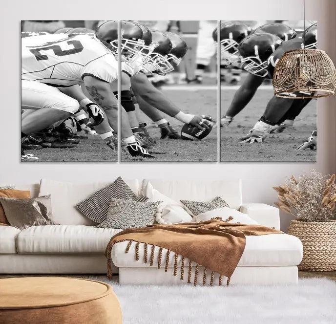 The "American Football Player Wall Art Canvas Print," beautifully rendered in black and white, captures a football scrimmage line and is printed on museum-quality canvas. This artwork is divided into three stunning panels and comes ready to hang for easy integration into your space.