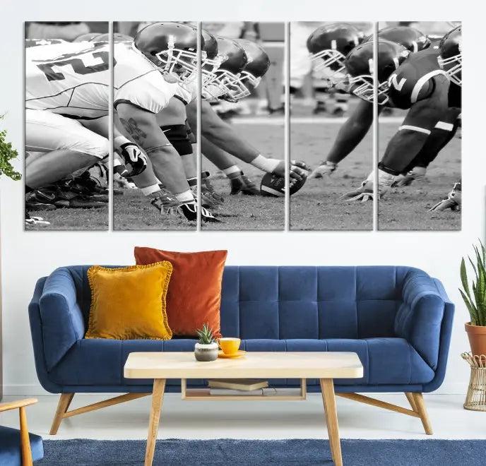 The "American Football Player Wall Art Canvas Print," beautifully rendered in black and white, captures a football scrimmage line and is printed on museum-quality canvas. This artwork is divided into three stunning panels and comes ready to hang for easy integration into your space.