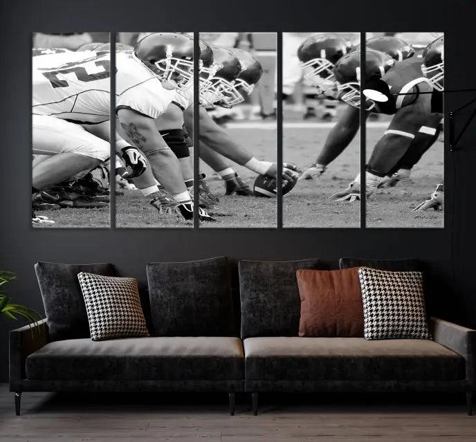 The "American Football Player Wall Art Canvas Print," beautifully rendered in black and white, captures a football scrimmage line and is printed on museum-quality canvas. This artwork is divided into three stunning panels and comes ready to hang for easy integration into your space.