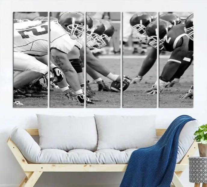 The "American Football Player Wall Art Canvas Print," beautifully rendered in black and white, captures a football scrimmage line and is printed on museum-quality canvas. This artwork is divided into three stunning panels and comes ready to hang for easy integration into your space.