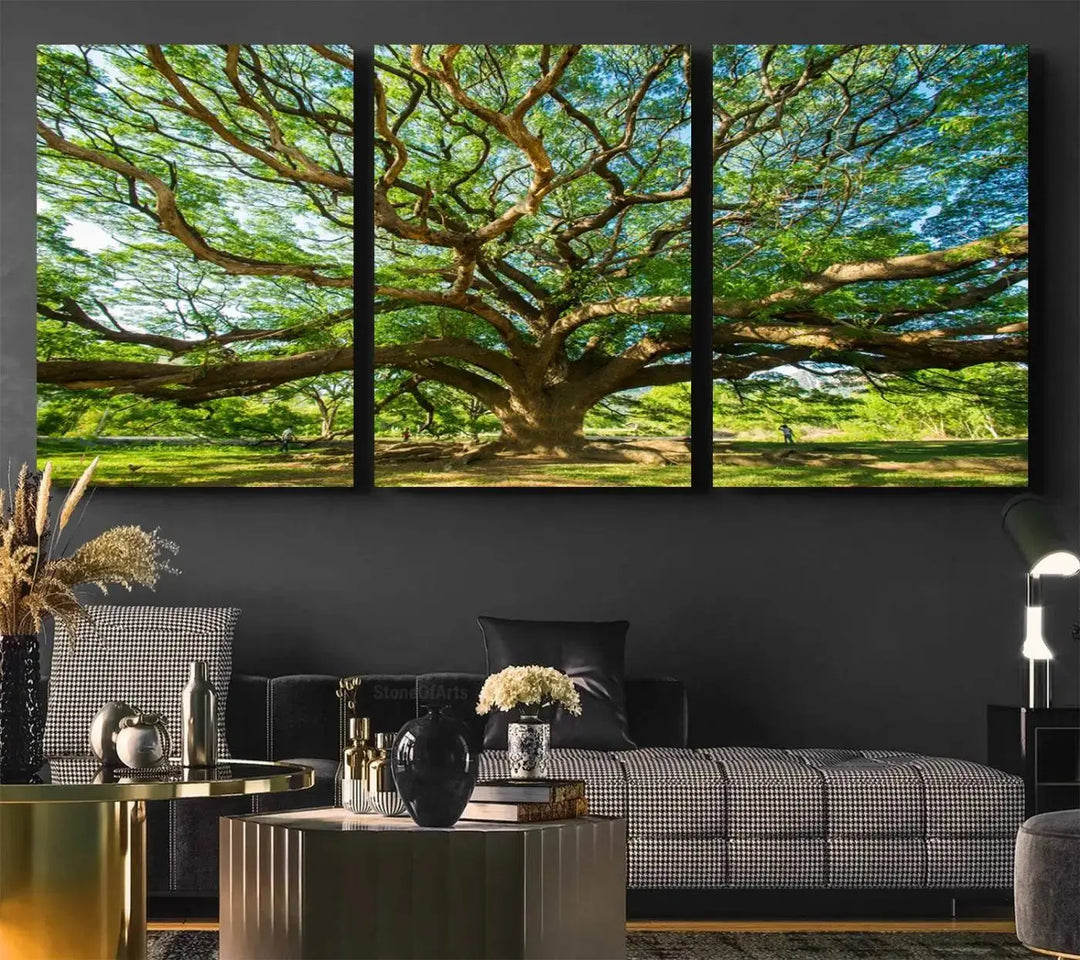 The Angel Oak Tree Wall Art, a multi-panel canvas print showcasing a large tree with sprawling branches and green leaves in a style reminiscent of the majestic Angel Oak Tree, elegantly adorns the wooden wall in the living room.