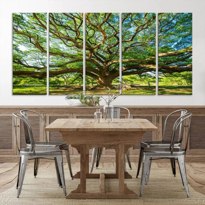 The Angel Oak Tree Wall Art, a multi-panel canvas print showcasing a large tree with sprawling branches and green leaves in a style reminiscent of the majestic Angel Oak Tree, elegantly adorns the wooden wall in the living room.