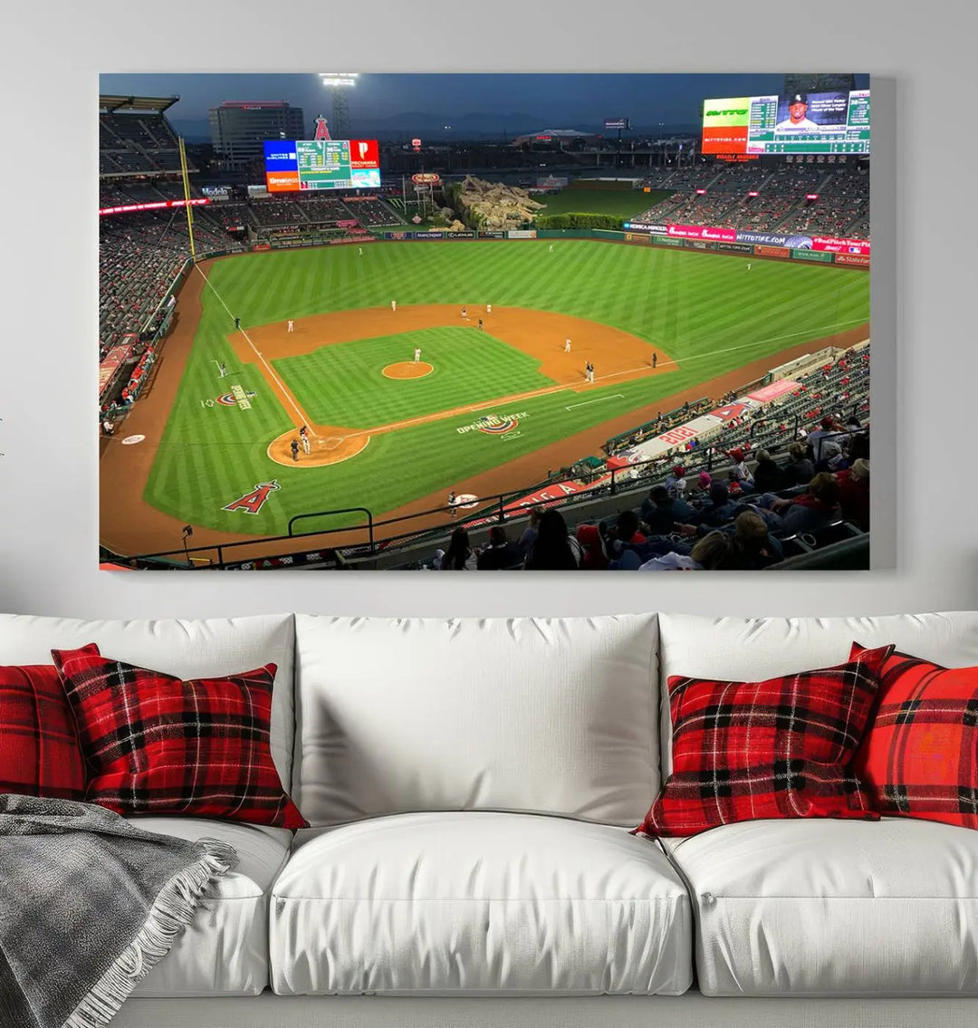 The living room features a sports-themed decor with a framed, ready-to-hang triptych of the Angel Stadium Aerial View – Los Angeles Angels Baseball Canvas Print.