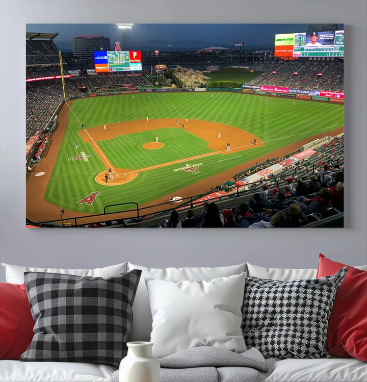 The living room features a sports-themed decor with a framed, ready-to-hang triptych of the Angel Stadium Aerial View – Los Angeles Angels Baseball Canvas Print.