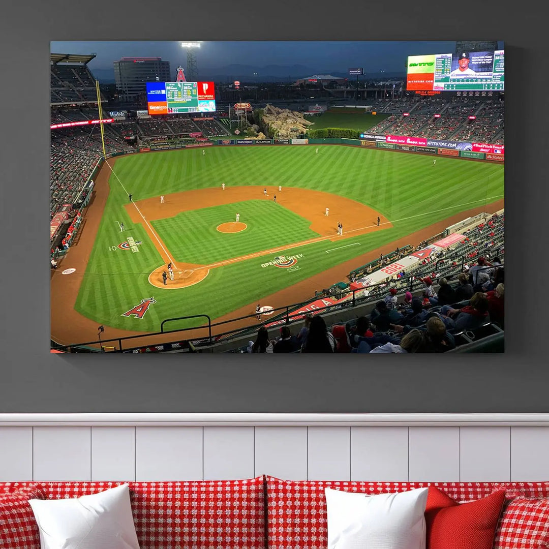 The living room features a sports-themed decor with a framed, ready-to-hang triptych of the Angel Stadium Aerial View – Los Angeles Angels Baseball Canvas Print.