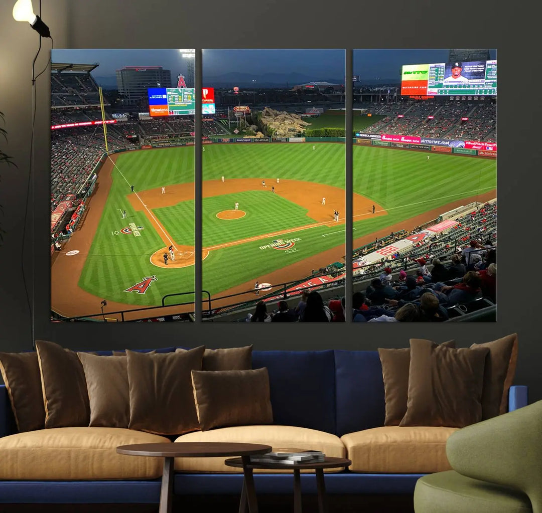 The living room features a sports-themed decor with a framed, ready-to-hang triptych of the Angel Stadium Aerial View – Los Angeles Angels Baseball Canvas Print.