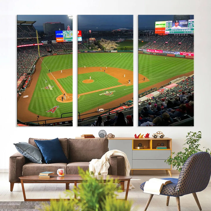 The living room features a sports-themed decor with a framed, ready-to-hang triptych of the Angel Stadium Aerial View – Los Angeles Angels Baseball Canvas Print.