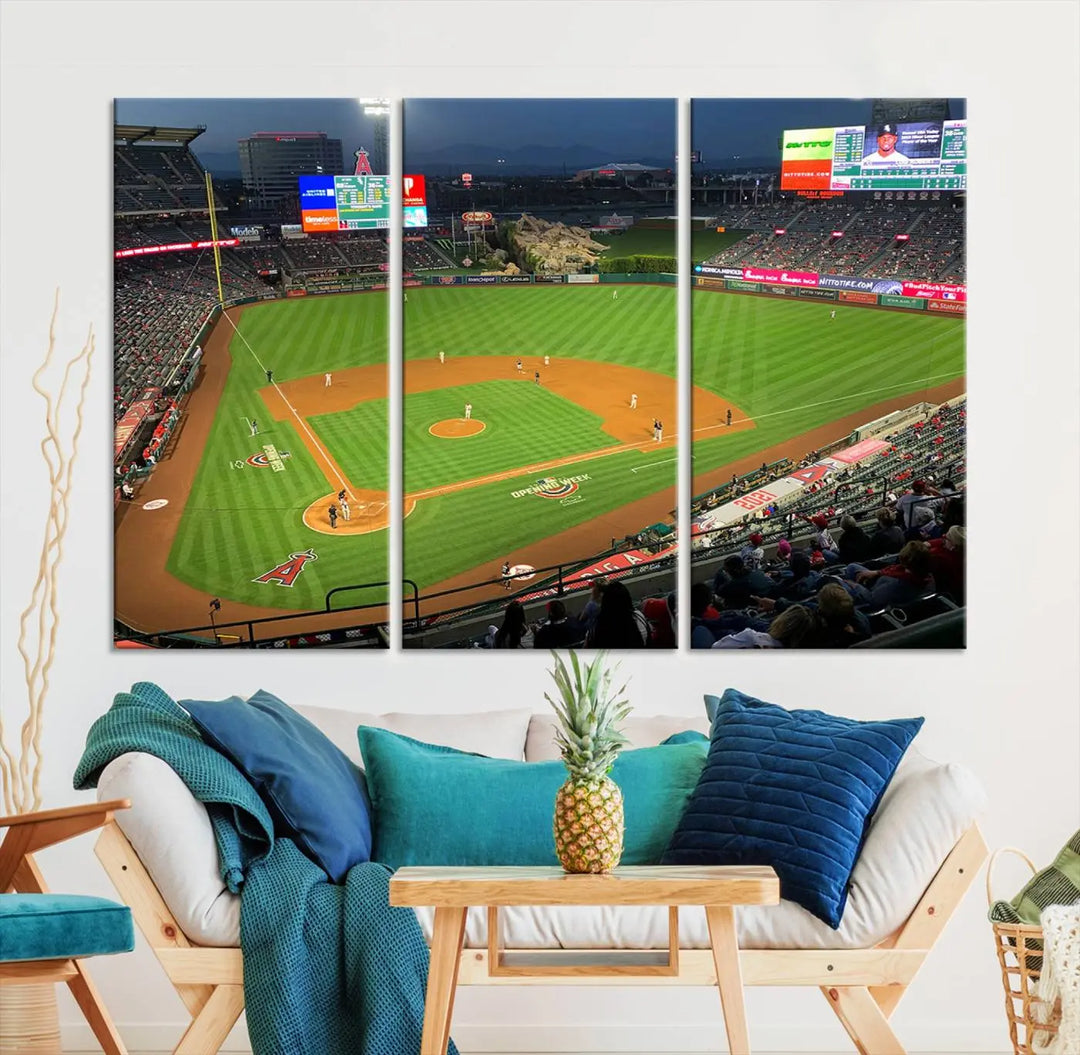 The living room features a sports-themed decor with a framed, ready-to-hang triptych of the Angel Stadium Aerial View – Los Angeles Angels Baseball Canvas Print.