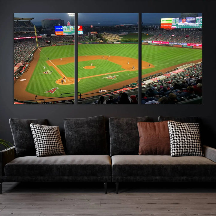 The living room features a sports-themed decor with a framed, ready-to-hang triptych of the Angel Stadium Aerial View – Los Angeles Angels Baseball Canvas Print.