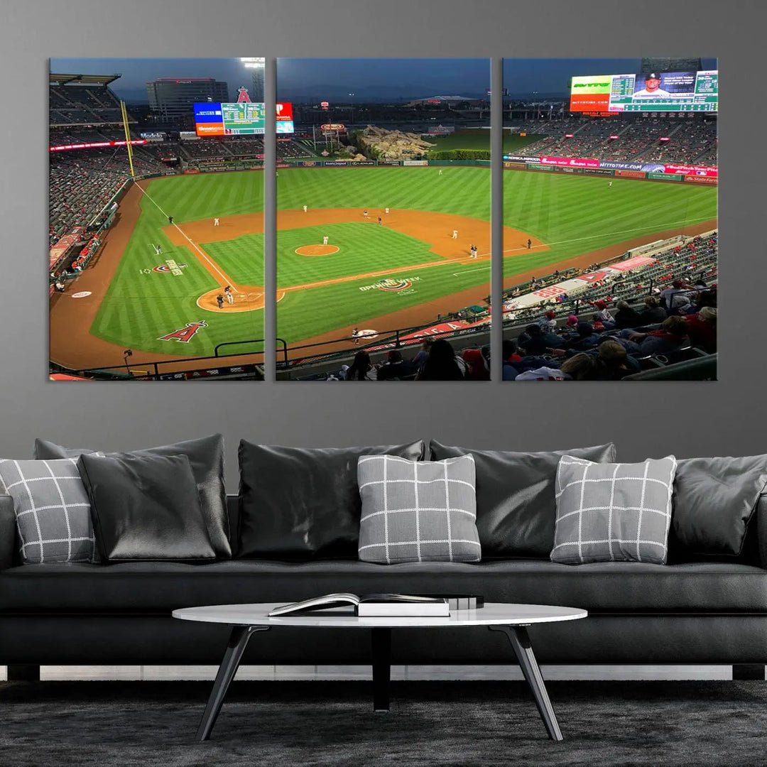 The living room features a sports-themed decor with a framed, ready-to-hang triptych of the Angel Stadium Aerial View – Los Angeles Angels Baseball Canvas Print.