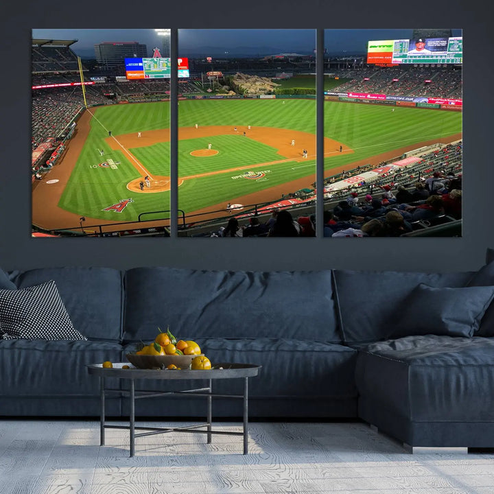 The living room features a sports-themed decor with a framed, ready-to-hang triptych of the Angel Stadium Aerial View – Los Angeles Angels Baseball Canvas Print.