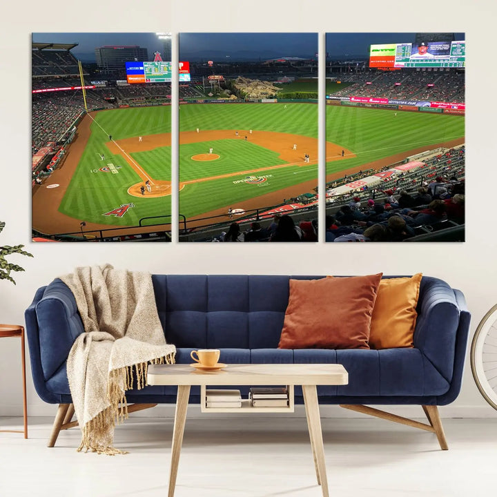 The living room features a sports-themed decor with a framed, ready-to-hang triptych of the Angel Stadium Aerial View – Los Angeles Angels Baseball Canvas Print.