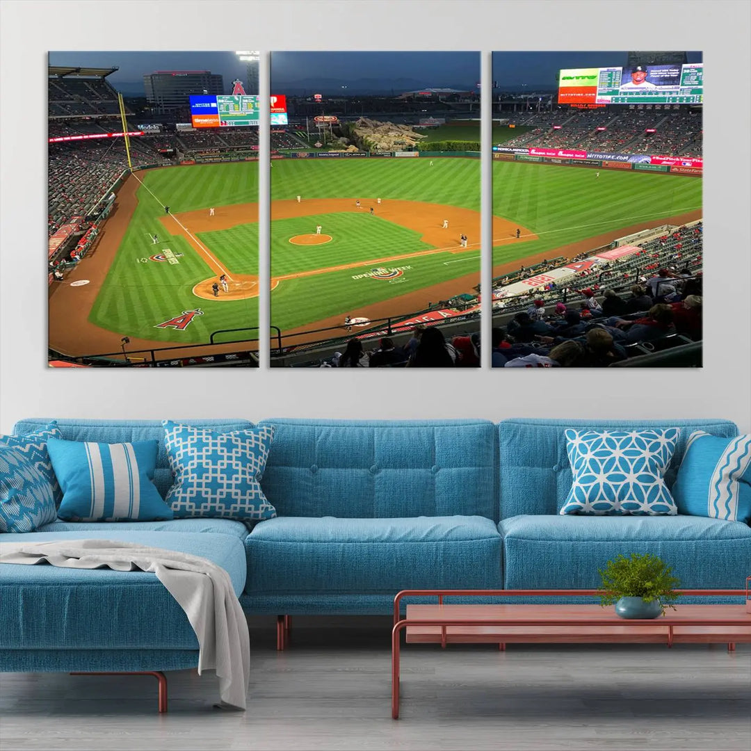 The living room features a sports-themed decor with a framed, ready-to-hang triptych of the Angel Stadium Aerial View – Los Angeles Angels Baseball Canvas Print.