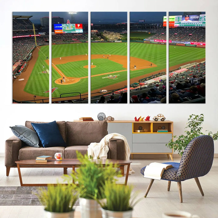 The living room features a sports-themed decor with a framed, ready-to-hang triptych of the Angel Stadium Aerial View – Los Angeles Angels Baseball Canvas Print.