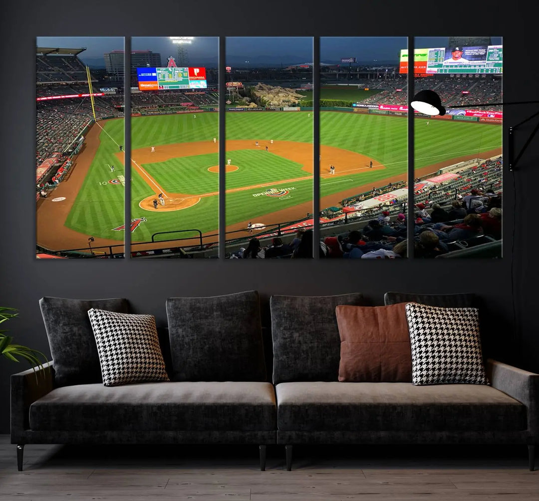 The living room features a sports-themed decor with a framed, ready-to-hang triptych of the Angel Stadium Aerial View – Los Angeles Angels Baseball Canvas Print.