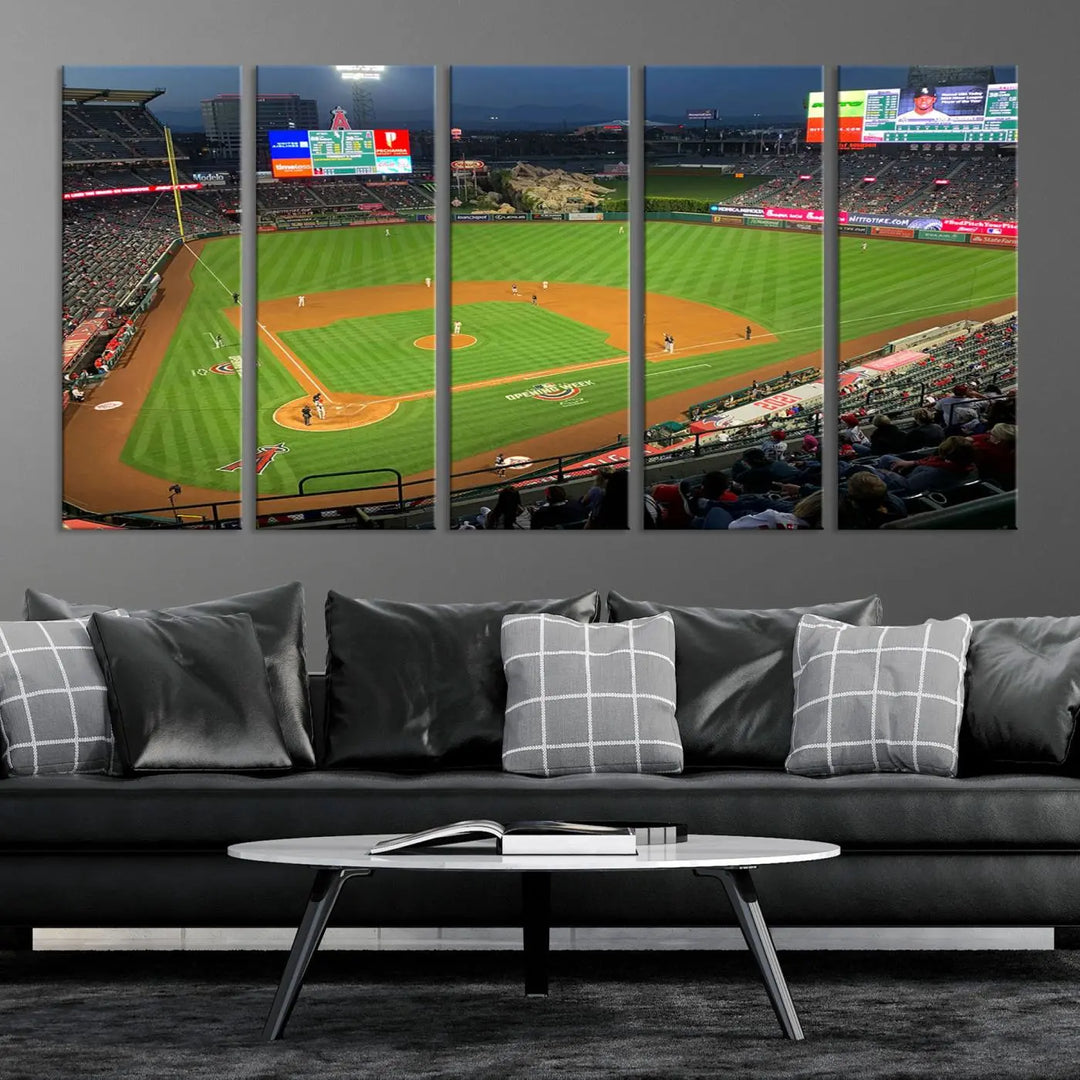 The living room features a sports-themed decor with a framed, ready-to-hang triptych of the Angel Stadium Aerial View – Los Angeles Angels Baseball Canvas Print.