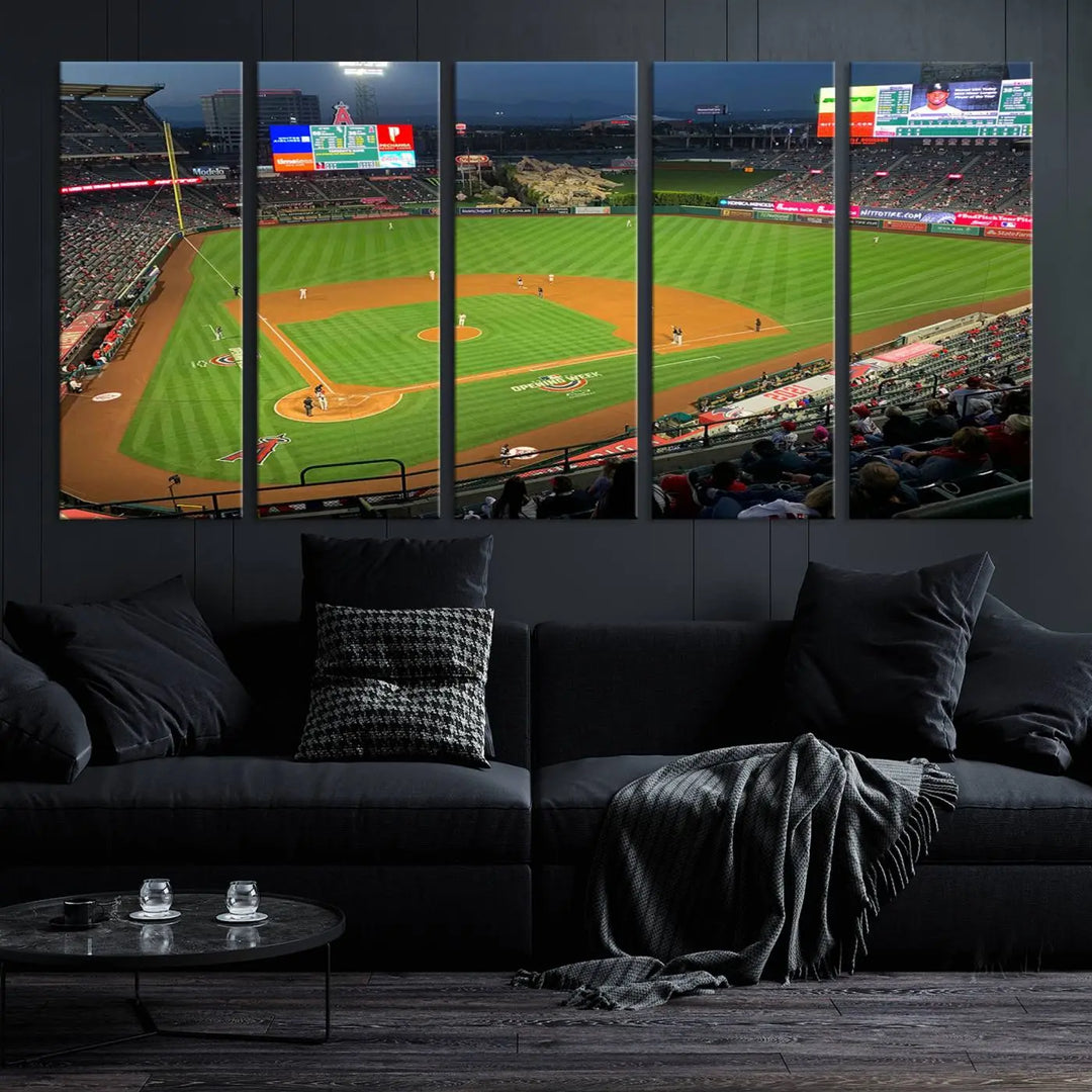 The living room features a sports-themed decor with a framed, ready-to-hang triptych of the Angel Stadium Aerial View – Los Angeles Angels Baseball Canvas Print.