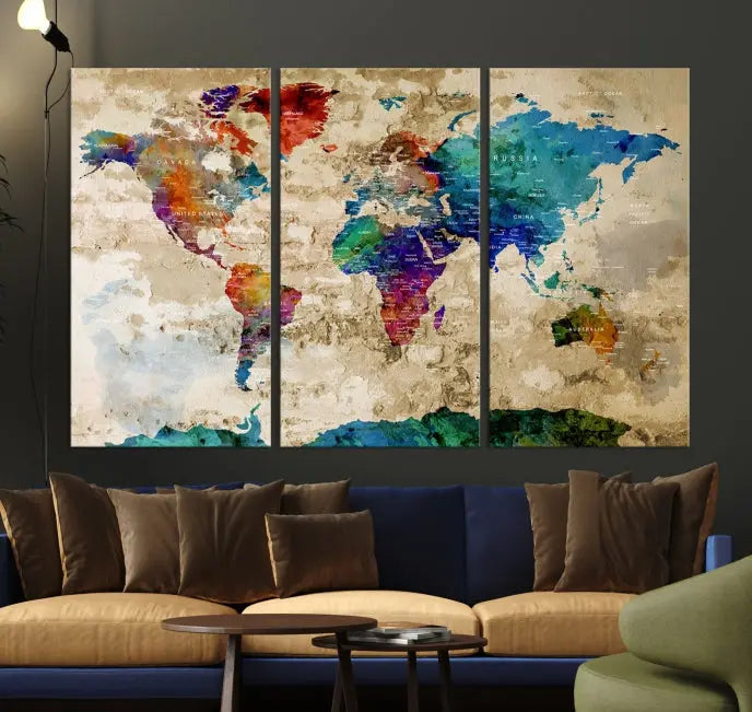 The contemporary living room showcases the "Watercolor Wall Art Push Pin World Map w/ Antarctica Canvas Print" on the wall. This museum-quality canvas is equipped with a UV-protective coating, guaranteeing vibrant colors endure for years, and it's ready to hang for an immediate style enhancement.