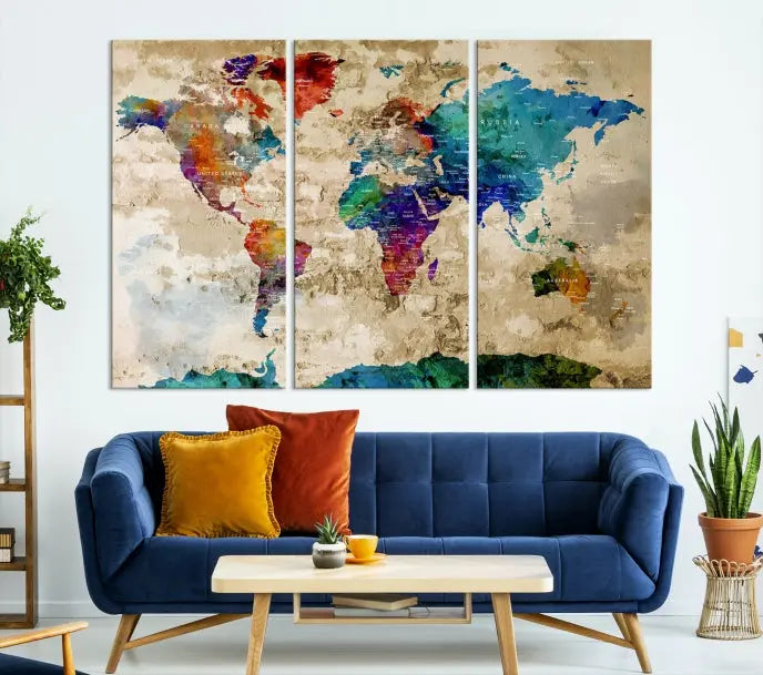 The contemporary living room showcases the "Watercolor Wall Art Push Pin World Map w/ Antarctica Canvas Print" on the wall. This museum-quality canvas is equipped with a UV-protective coating, guaranteeing vibrant colors endure for years, and it's ready to hang for an immediate style enhancement.