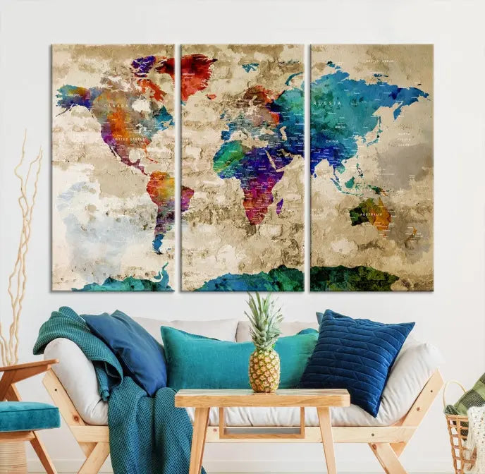 The contemporary living room showcases the "Watercolor Wall Art Push Pin World Map w/ Antarctica Canvas Print" on the wall. This museum-quality canvas is equipped with a UV-protective coating, guaranteeing vibrant colors endure for years, and it's ready to hang for an immediate style enhancement.