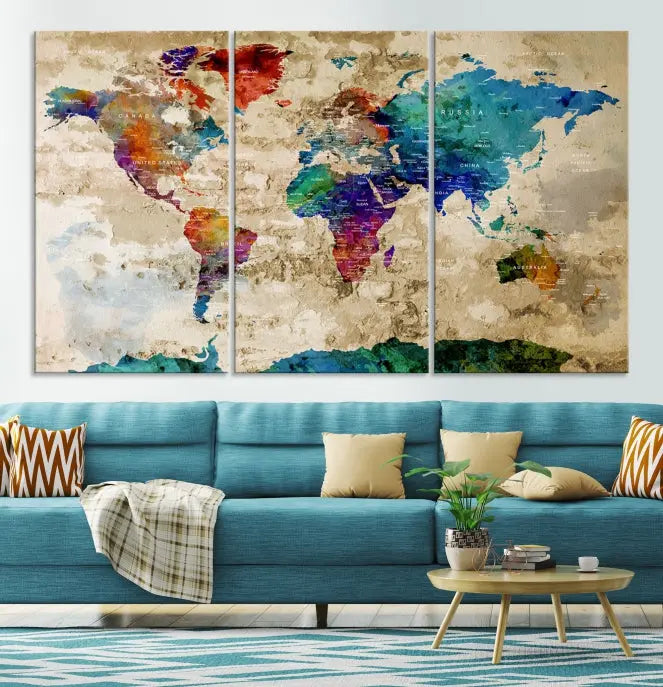 The contemporary living room showcases the "Watercolor Wall Art Push Pin World Map w/ Antarctica Canvas Print" on the wall. This museum-quality canvas is equipped with a UV-protective coating, guaranteeing vibrant colors endure for years, and it's ready to hang for an immediate style enhancement.