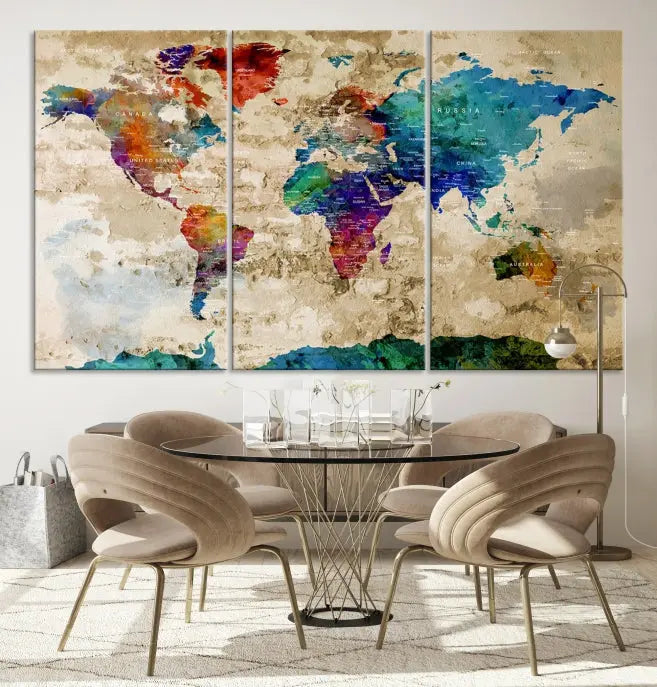 The contemporary living room showcases the "Watercolor Wall Art Push Pin World Map w/ Antarctica Canvas Print" on the wall. This museum-quality canvas is equipped with a UV-protective coating, guaranteeing vibrant colors endure for years, and it's ready to hang for an immediate style enhancement.