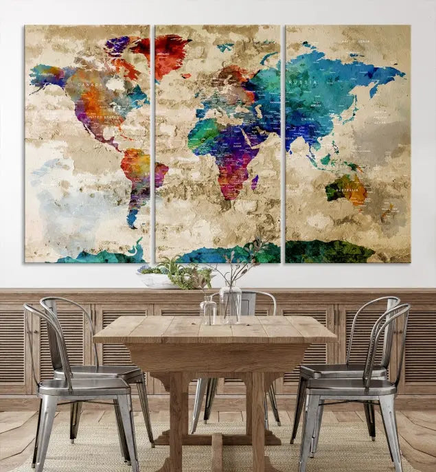 The contemporary living room showcases the "Watercolor Wall Art Push Pin World Map w/ Antarctica Canvas Print" on the wall. This museum-quality canvas is equipped with a UV-protective coating, guaranteeing vibrant colors endure for years, and it's ready to hang for an immediate style enhancement.