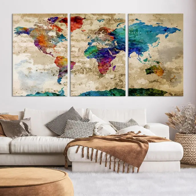 The contemporary living room showcases the "Watercolor Wall Art Push Pin World Map w/ Antarctica Canvas Print" on the wall. This museum-quality canvas is equipped with a UV-protective coating, guaranteeing vibrant colors endure for years, and it's ready to hang for an immediate style enhancement.