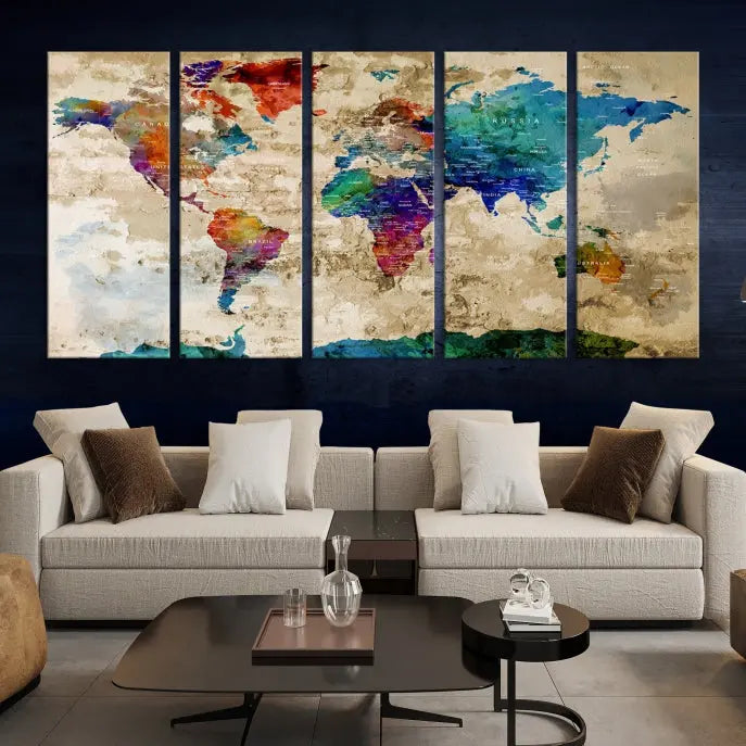 The contemporary living room showcases the "Watercolor Wall Art Push Pin World Map w/ Antarctica Canvas Print" on the wall. This museum-quality canvas is equipped with a UV-protective coating, guaranteeing vibrant colors endure for years, and it's ready to hang for an immediate style enhancement.