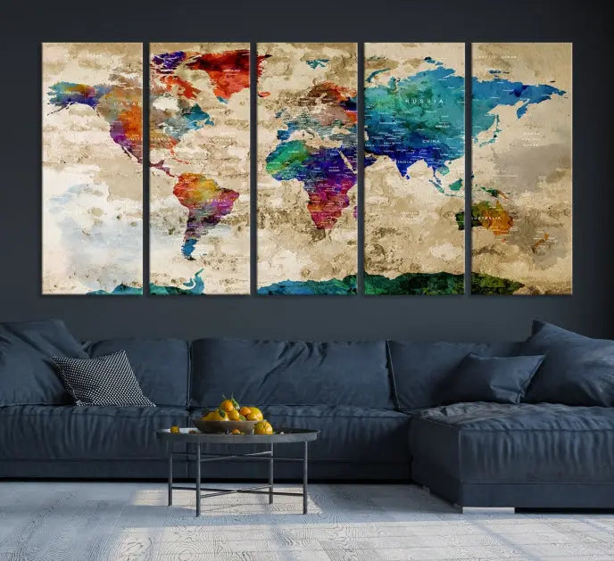 The contemporary living room showcases the "Watercolor Wall Art Push Pin World Map w/ Antarctica Canvas Print" on the wall. This museum-quality canvas is equipped with a UV-protective coating, guaranteeing vibrant colors endure for years, and it's ready to hang for an immediate style enhancement.