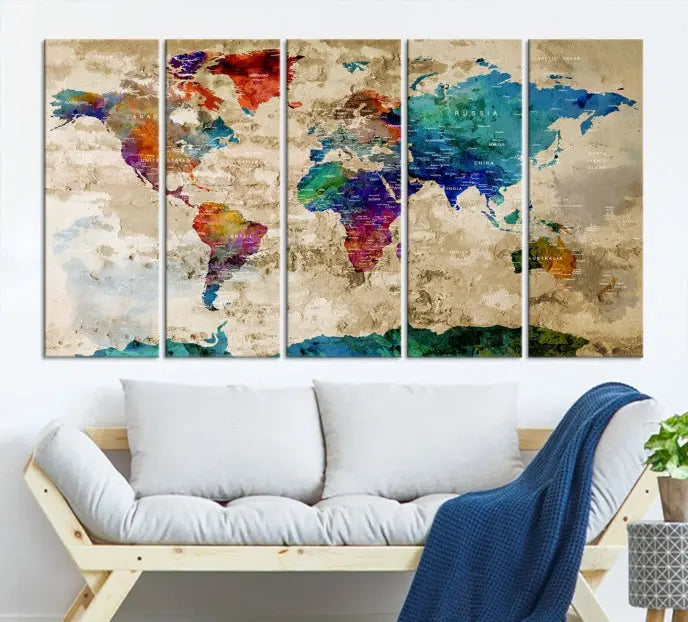 The contemporary living room showcases the "Watercolor Wall Art Push Pin World Map w/ Antarctica Canvas Print" on the wall. This museum-quality canvas is equipped with a UV-protective coating, guaranteeing vibrant colors endure for years, and it's ready to hang for an immediate style enhancement.