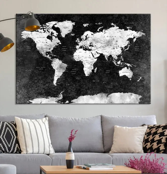 The Push Pin World Map with Antarctica Canvas Wall Art Print, featuring a UV-protective coating, hangs prominently in the room.