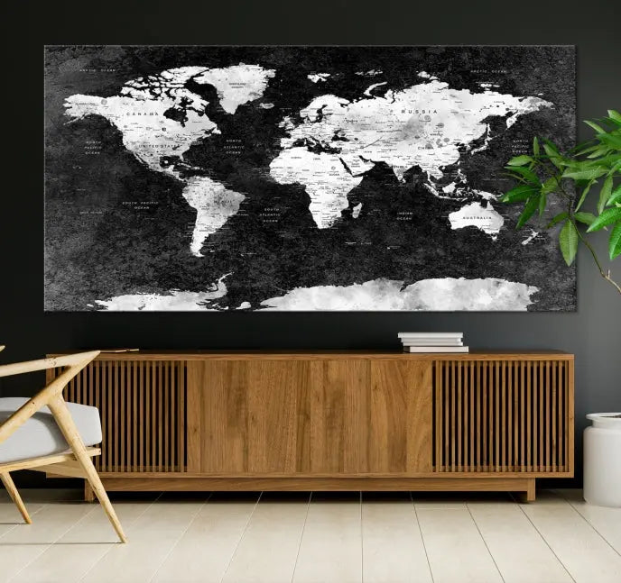 The Push Pin World Map with Antarctica Canvas Wall Art Print, featuring a UV-protective coating, hangs prominently in the room.