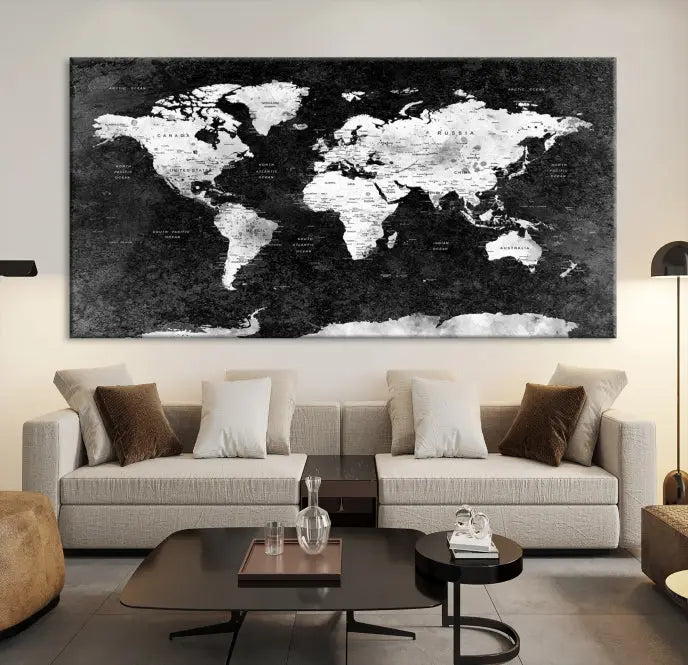 The Push Pin World Map with Antarctica Canvas Wall Art Print, featuring a UV-protective coating, hangs prominently in the room.