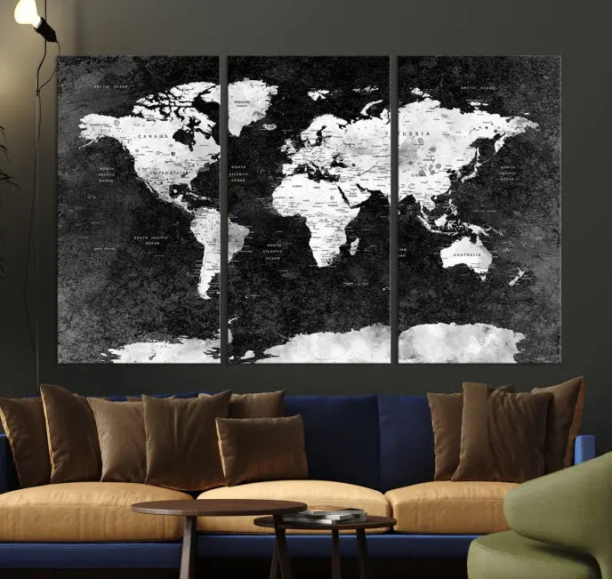 The Push Pin World Map with Antarctica Canvas Wall Art Print, featuring a UV-protective coating, hangs prominently in the room.