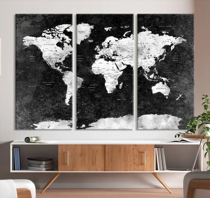 The Push Pin World Map with Antarctica Canvas Wall Art Print, featuring a UV-protective coating, hangs prominently in the room.