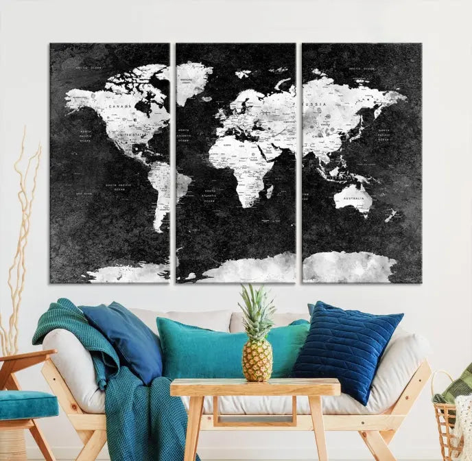 The Push Pin World Map with Antarctica Canvas Wall Art Print, featuring a UV-protective coating, hangs prominently in the room.