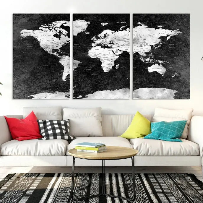 The Push Pin World Map with Antarctica Canvas Wall Art Print, featuring a UV-protective coating, hangs prominently in the room.