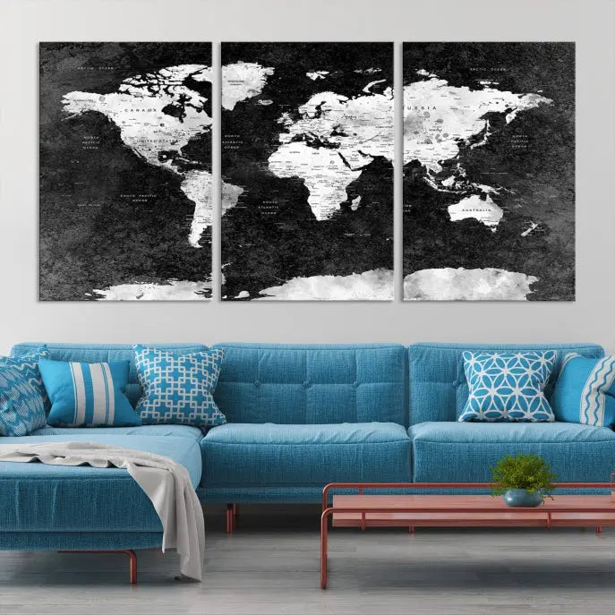 The Push Pin World Map with Antarctica Canvas Wall Art Print, featuring a UV-protective coating, hangs prominently in the room.