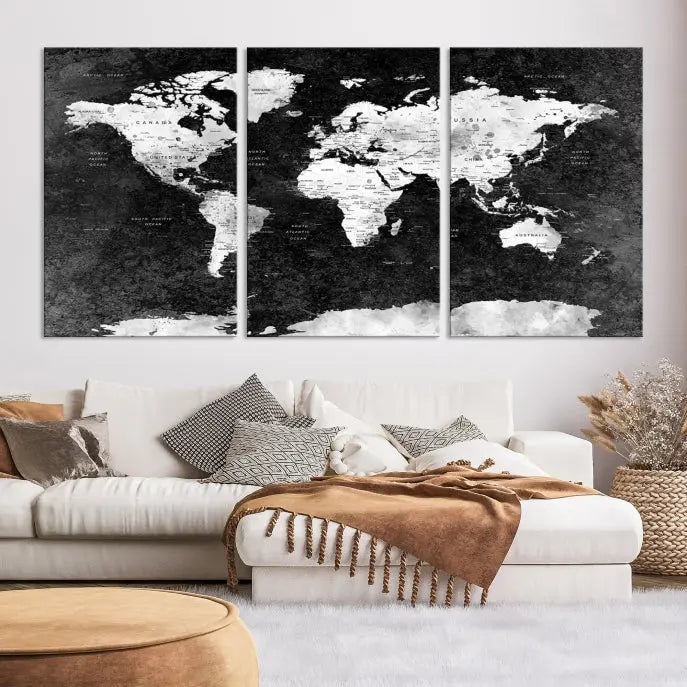 The Push Pin World Map with Antarctica Canvas Wall Art Print, featuring a UV-protective coating, hangs prominently in the room.