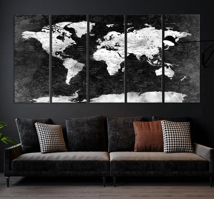 The Push Pin World Map with Antarctica Canvas Wall Art Print, featuring a UV-protective coating, hangs prominently in the room.