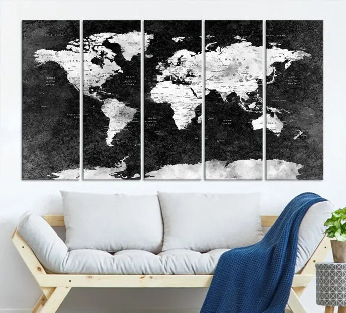 The Push Pin World Map with Antarctica Canvas Wall Art Print, featuring a UV-protective coating, hangs prominently in the room.