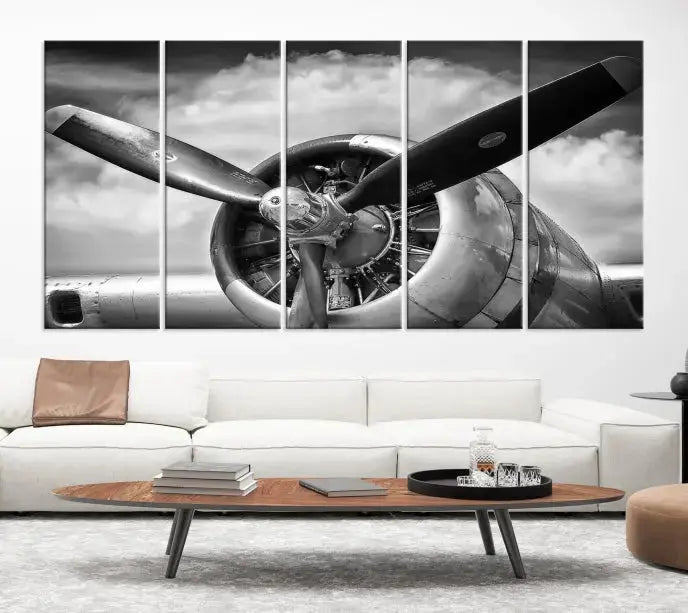 The "Antique War Airplane Wall Art Canvas Print," featuring a black and white airplane propeller, graces the space, adding an elegant touch. Order this remarkable piece now to enjoy free shipping.