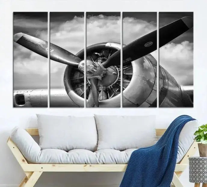 The "Antique War Airplane Wall Art Canvas Print," featuring a black and white airplane propeller, graces the space, adding an elegant touch. Order this remarkable piece now to enjoy free shipping.