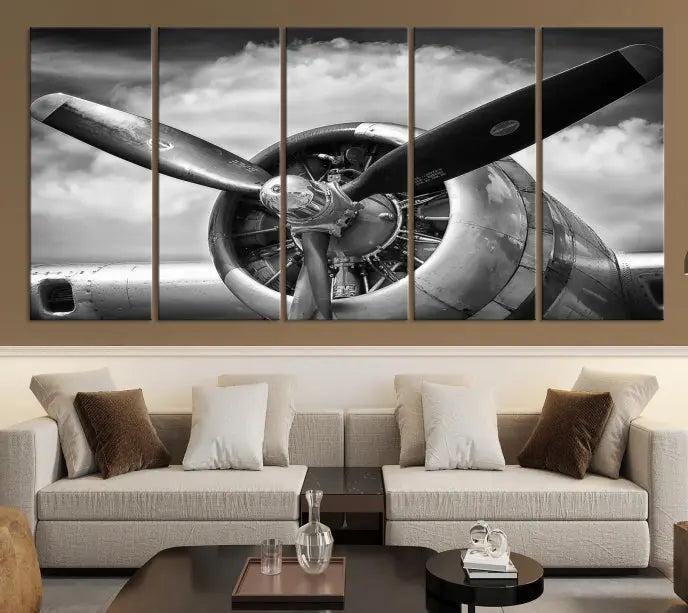 The "Antique War Airplane Wall Art Canvas Print," featuring a black and white airplane propeller, graces the space, adding an elegant touch. Order this remarkable piece now to enjoy free shipping.