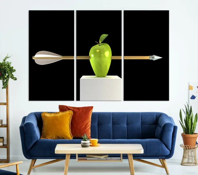 The "Apple and Arrow Wall Art Apple Illustr Canvas Print" is a triptych art piece depicting an arrow through a green apple on a black background. This gallery-wrapped artwork, printed on museum-quality canvas, ensures vibrancy and durability.