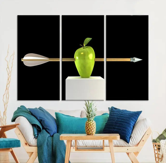 The "Apple and Arrow Wall Art Apple Illustr Canvas Print" is a triptych art piece depicting an arrow through a green apple on a black background. This gallery-wrapped artwork, printed on museum-quality canvas, ensures vibrancy and durability.